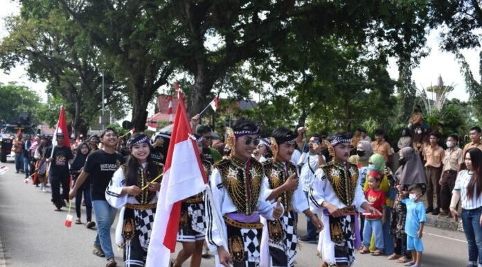 Polres Tanah Laut Gelar Kirab Merah Putih Untuk Indonesia Harmoni